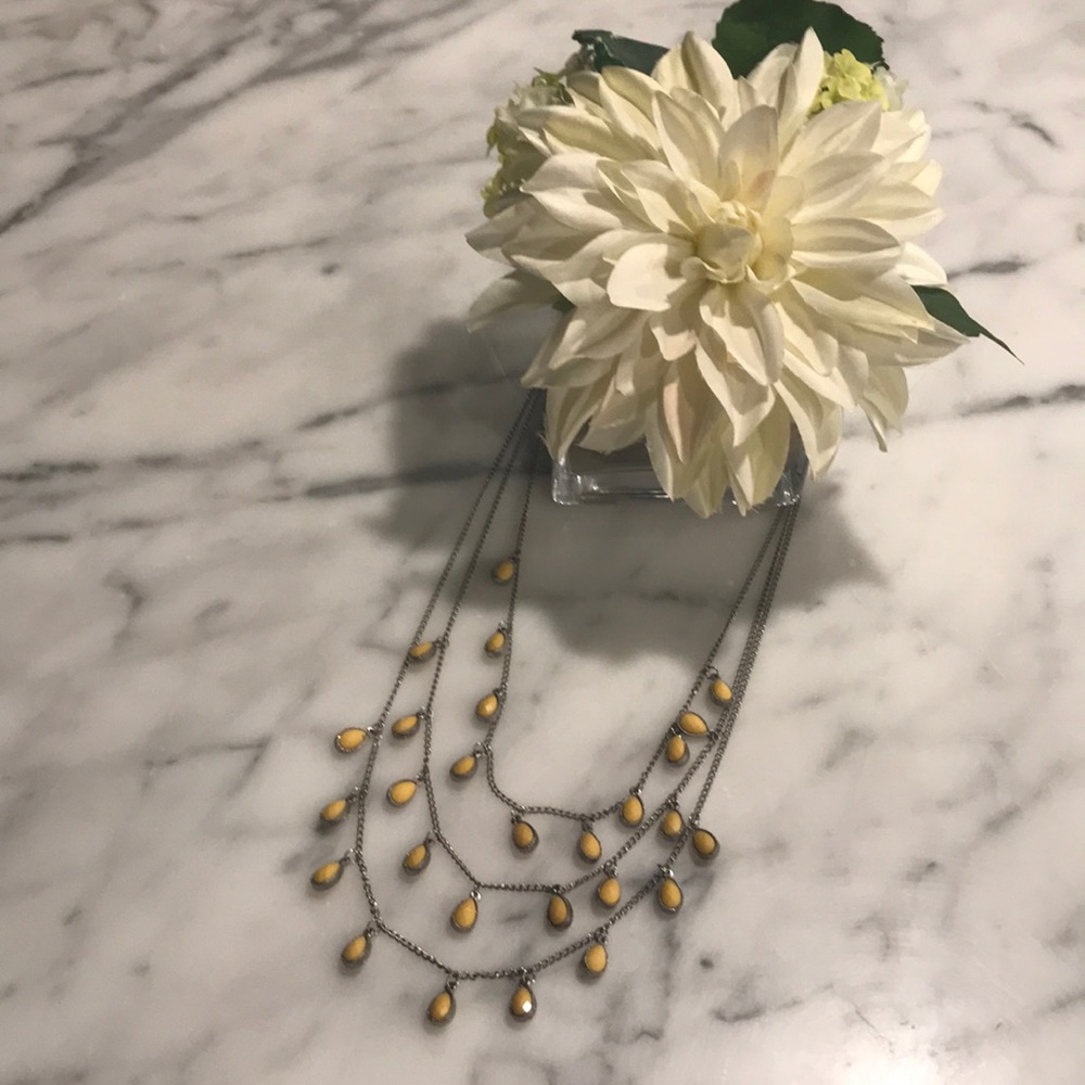 Silver and yellow long beaded dangle necklace.